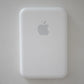 White Apple device on a gray background